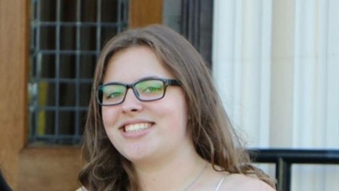 Leah stood outside the Hazelrigg building